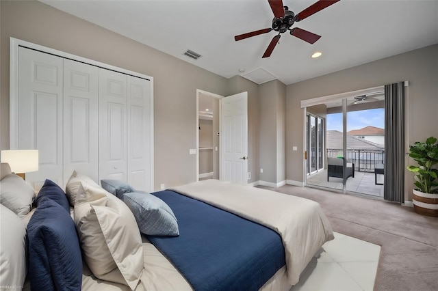 carpeted bedroom featuring access to exterior, ceiling fan, and a closet