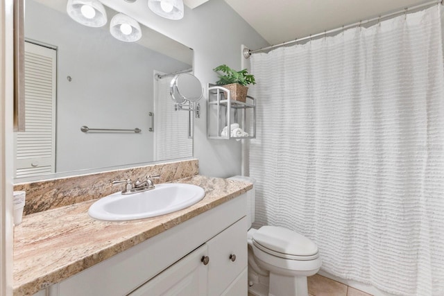 bathroom featuring tile patterned flooring, vanity, toilet, and a shower with curtain