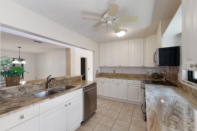 3601 Quail Hollow Ln, Bradenton, FL 34210 - kitchen with a sink, dishwasher, backsplash, white cabinetry, and light tile patterned flooring
