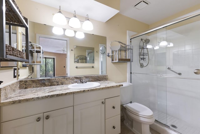 3601 Quail Hollow Ln, Bradenton, FL 34210 - bathroom featuring toilet, a stall shower, and vanity