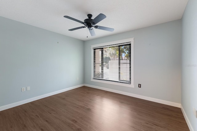 3601 Quail Hollow Ln, Bradenton, FL 34210 - unfurnished room with dark wood finished floors, baseboards, and ceiling fan