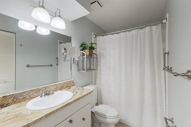 3601 Quail Hollow Ln, Bradenton, FL 34210 - bathroom featuring toilet, vanity, and a shower with curtain