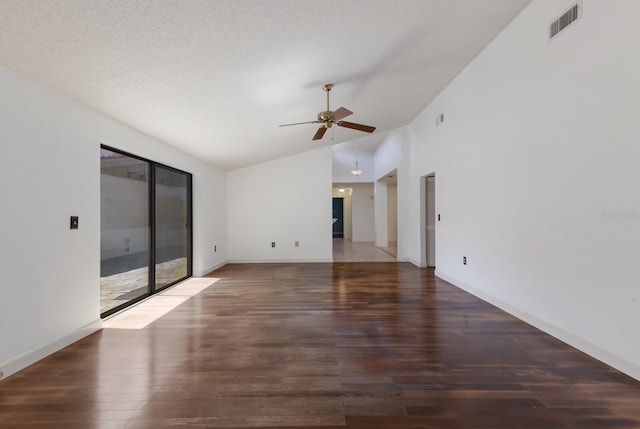 3601 Quail Hollow Ln, Bradenton, FL 34210 - empty room with ceiling fan, vaulted ceiling, wood finished floors, and baseboards