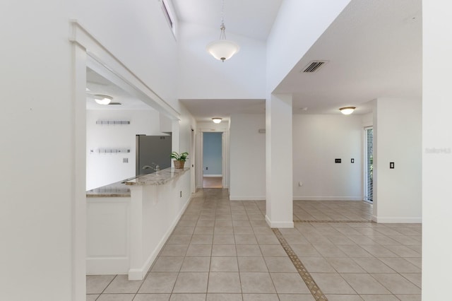 3601 Quail Hollow Ln, Bradenton, FL 34210 - entrance foyer featuring light tile patterned floors and baseboards