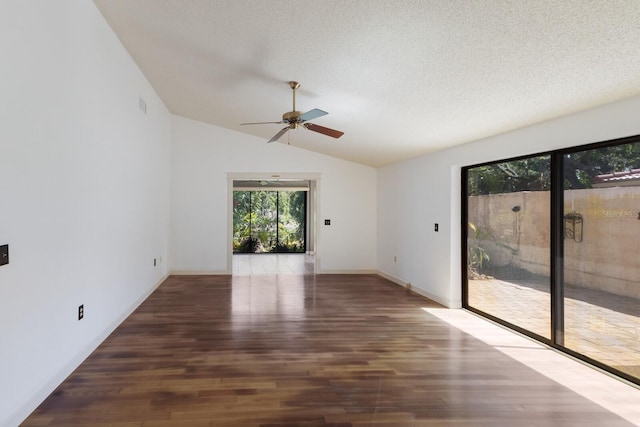 3601 Quail Hollow Ln, Bradenton, FL 34210 - empty room featuring wood finished floors, a ceiling fan, lofted ceiling, and a textured ceiling