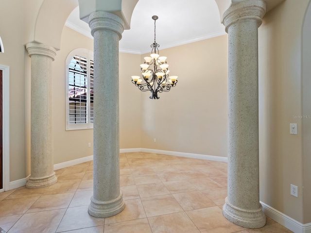 interior space with light tile patterned floors, decorative columns, crown molding, and a notable chandelier