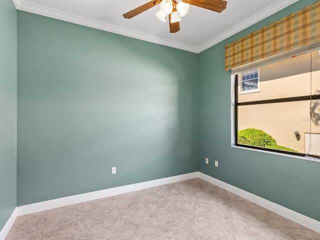 spare room with ceiling fan, a healthy amount of sunlight, and crown molding