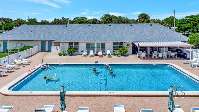 view of swimming pool with a patio