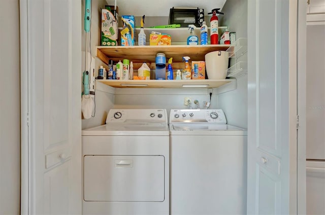 washroom featuring washer and dryer