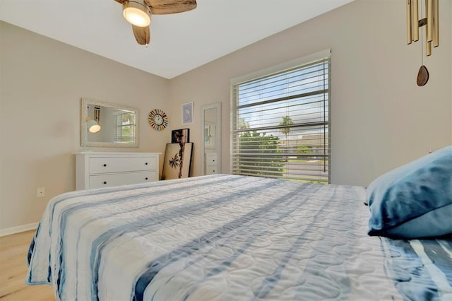 bedroom featuring ceiling fan and wood-type flooring