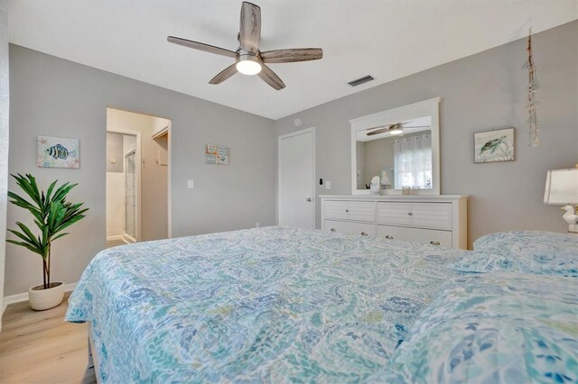 bedroom featuring ceiling fan and light wood-type flooring