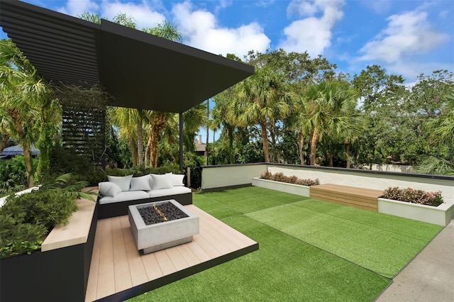 view of yard with an outdoor fire pit