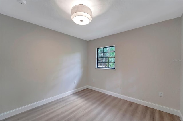 empty room with light wood-type flooring