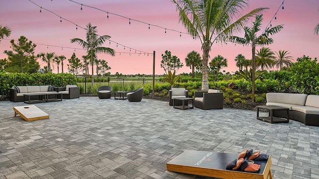 patio terrace at dusk with outdoor lounge area