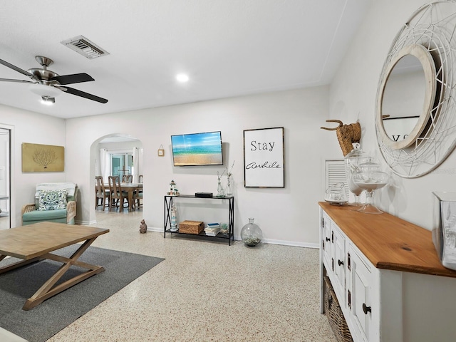 living room with ceiling fan