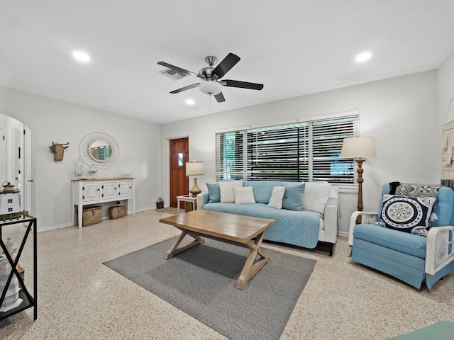 living room featuring ceiling fan