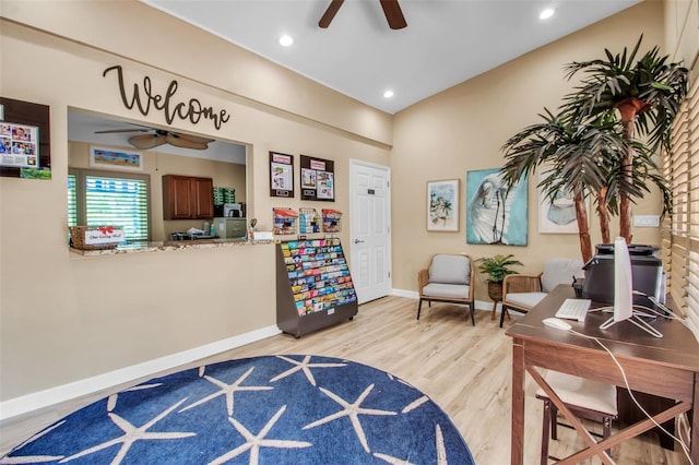 bedroom with light wood-type flooring and ceiling fan