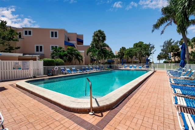 view of swimming pool featuring a patio