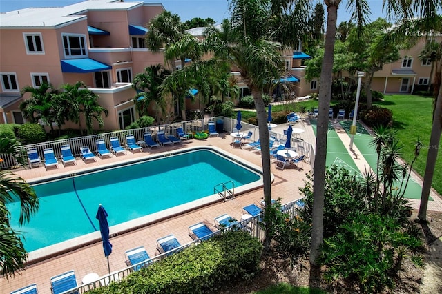 view of swimming pool featuring a patio