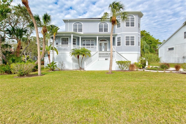 view of front of home featuring a porch and a front yard