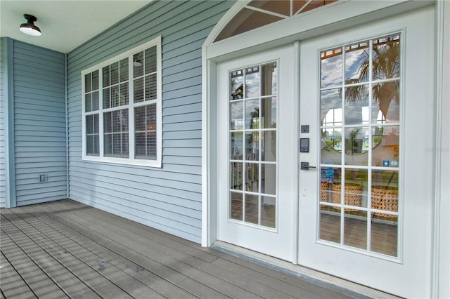 doorway to property featuring a deck