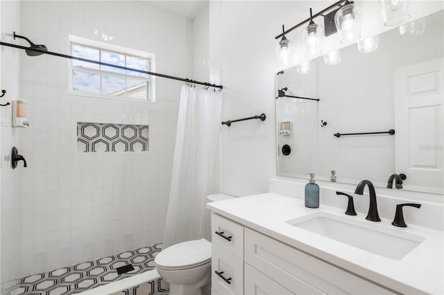 bathroom with vanity, a shower with curtain, and toilet