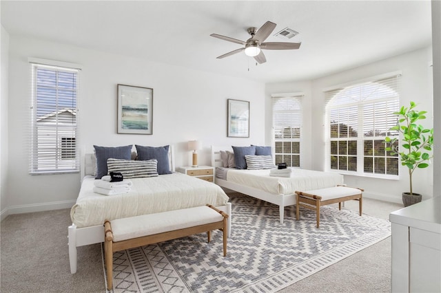 bedroom featuring ceiling fan and carpet floors