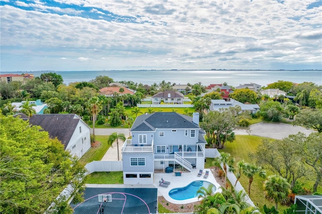 bird's eye view with a water view