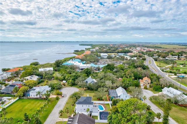 drone / aerial view with a water view