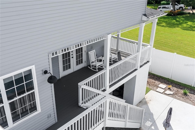 exterior space with a lawn and a wooden deck