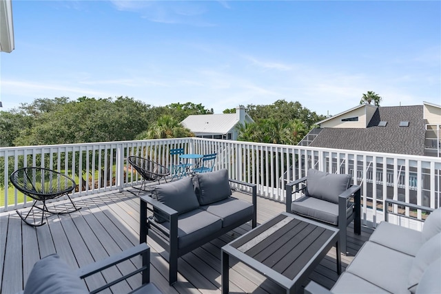 wooden deck featuring an outdoor living space