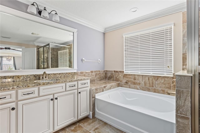 bathroom featuring crown molding, independent shower and bath, vanity, and ceiling fan