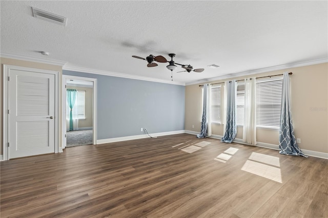 unfurnished living room featuring ceiling fan, hardwood / wood-style flooring, crown molding, and a textured ceiling