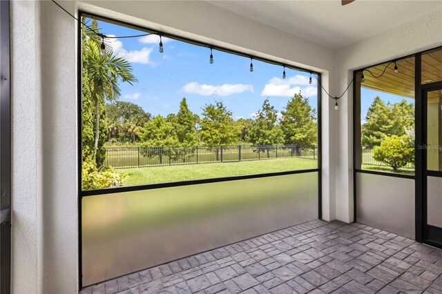 view of unfurnished sunroom