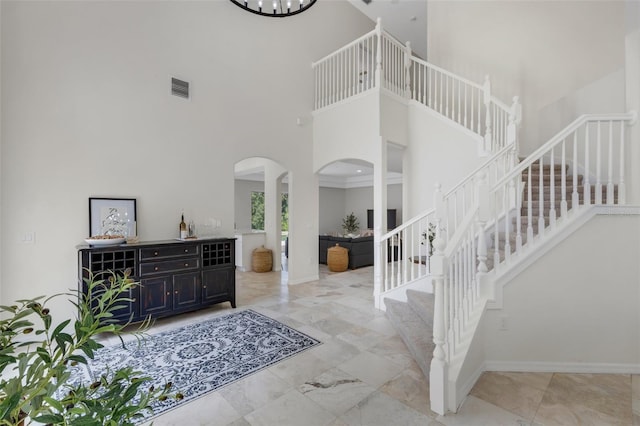 entrance foyer featuring a high ceiling