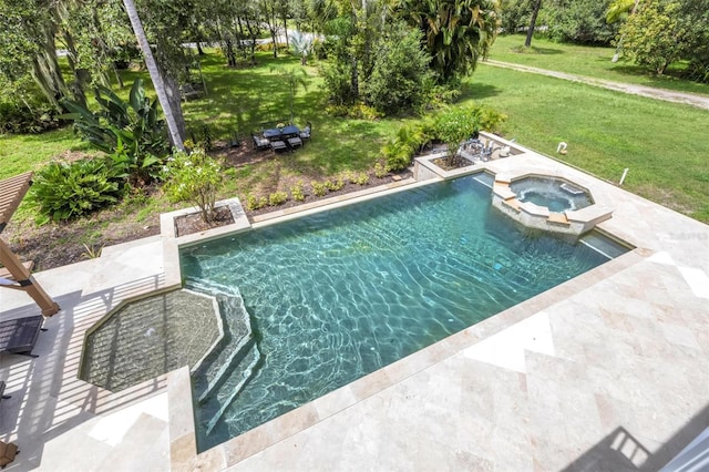 view of pool with a yard, an in ground hot tub, and a patio