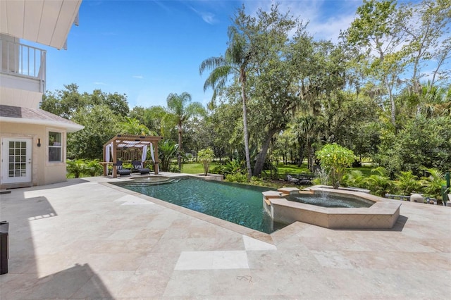 view of swimming pool featuring a pergola, a patio area, and an in ground hot tub