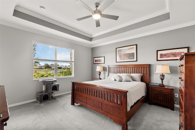 bedroom with crown molding, ceiling fan, and light colored carpet