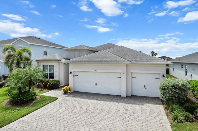 view of front of property with a garage