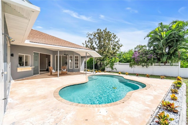 view of pool with a patio area and french doors