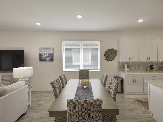 dining space featuring light hardwood / wood-style floors