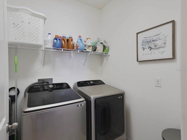 laundry area with washer and dryer