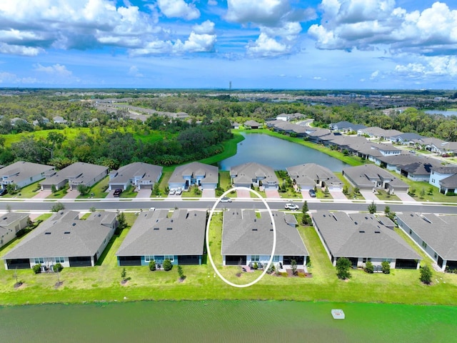 drone / aerial view with a water view