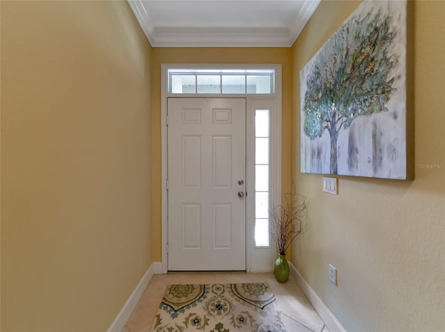 tiled foyer with crown molding and plenty of natural light