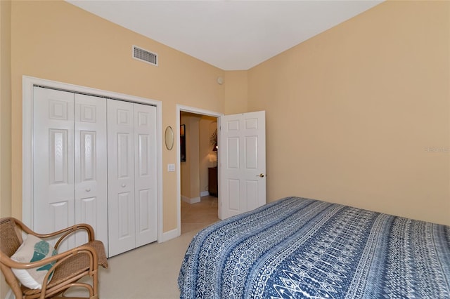 carpeted bedroom featuring a closet