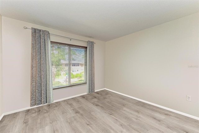 empty room featuring light hardwood / wood-style flooring