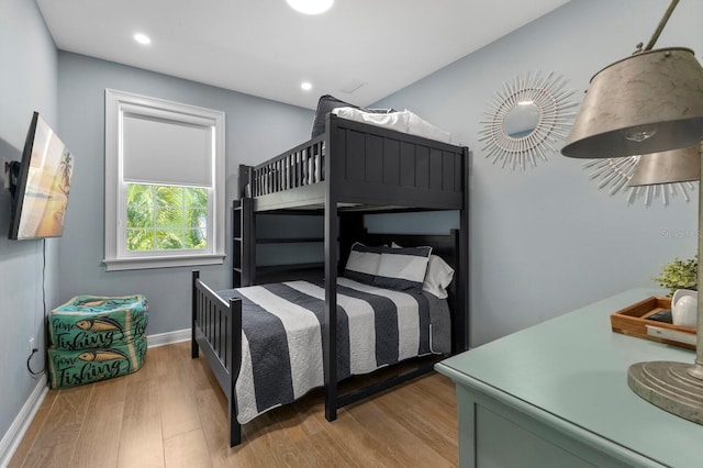 bedroom with light wood-type flooring