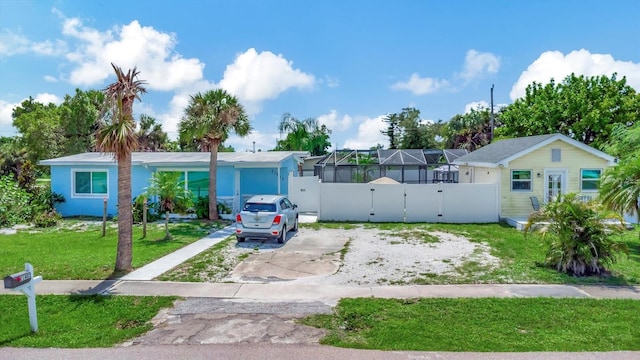 view of front of home featuring a front lawn