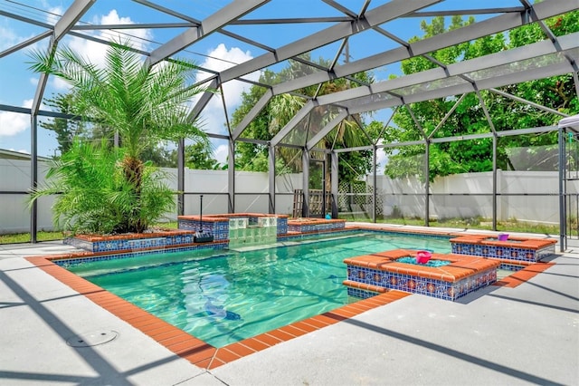 view of swimming pool with a lanai, an in ground hot tub, and pool water feature