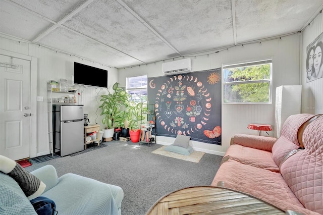 carpeted living room featuring a wall mounted AC